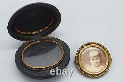 Antique Vulcanite Mourning Locket and Metal Mourning Brooch with Sepia Photo